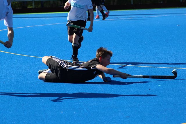 hockey-field-hockey-play-fun-activity-sports-ground-slip.jpg