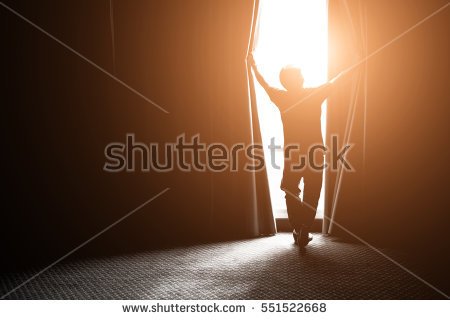 stock-photo-man-and-hope-concept-man-opening-window-curtains-551522668.jpg