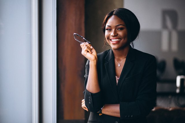 african-american-business-woman-by-window.jpg