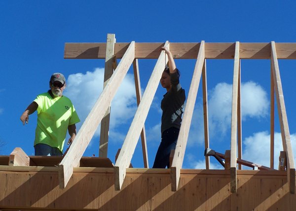 Construction - David and Arissa in rafters crop October 2019.jpg