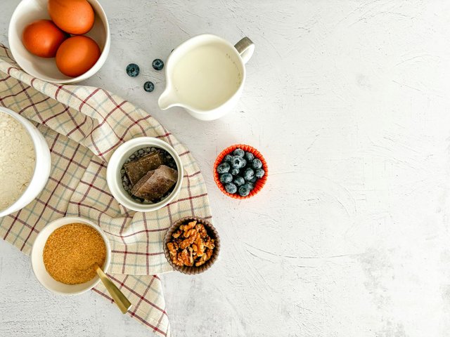 free-photo-of-top-view-of-cake-ingredients-standing-on-white-surface.jpeg