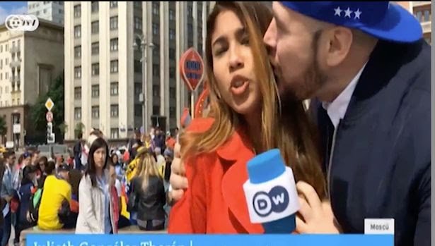 Female-sports-reporter-working-at-World-Cup-kissed-and-groped-on-the-breast-by-fan-on-live-TV.jpg