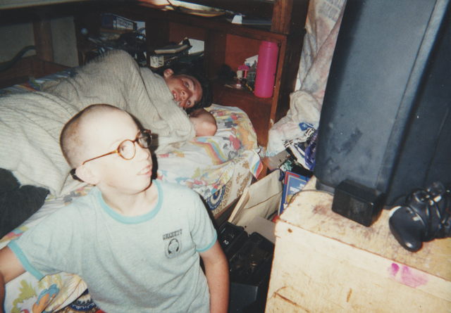 1997 Bald Joey & Ricky in Bed near N64.png