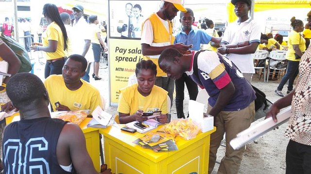 mtn_mobile_money_agents_registering_subscribers_onto_the_service.jpg