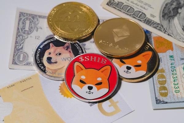 dogecoin-doge-bitcoin-ethereum-eth-shiba-coin-included-with-crypto-currency-coin-on-stack-100-hundred-new-us-dollar-money-american-virtual-blockchain-technology-future-is-money-close-up-concept-photo.jpg