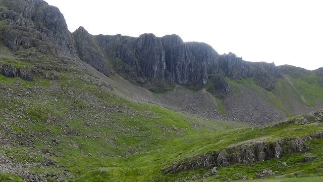 55 View back up to rocky buttresses.jpg