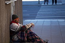 220px-Beggar_in_Uppsala,_Sweden.jpg