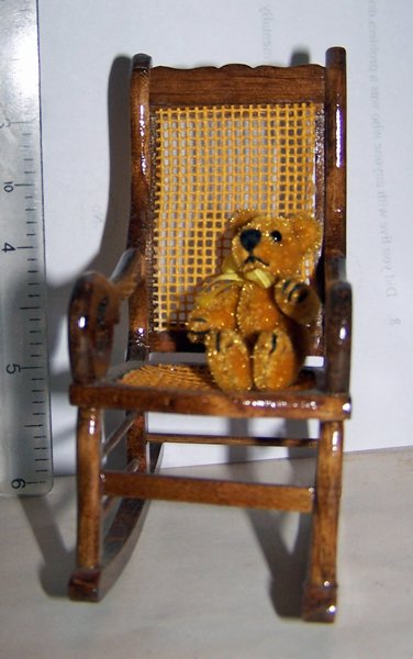 Tiny teddy in rocker crop May 2016.jpg