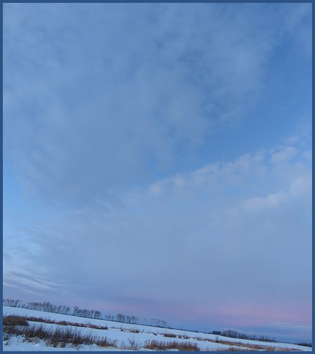 expansive sky sunset layered pink white dark blue and streaked.JPG