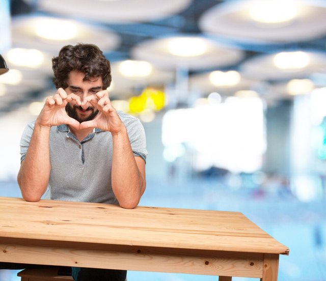 crazy-young-man-with-table-happy-expression_1194-4647.jpg