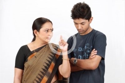 stock-photo-mid-aged-gujarati-mother-angrily-scolding-her-son-13024.jpg