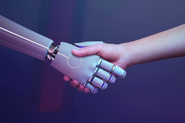 AI robot shaking hand with human.jpg