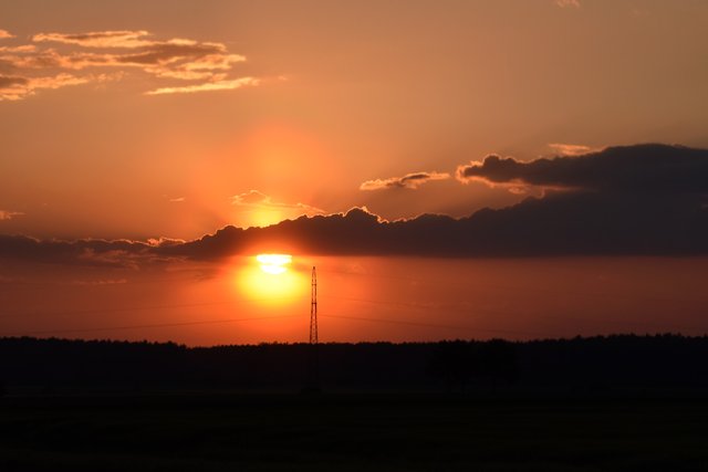 sunset electric poles clouds 1.jpg
