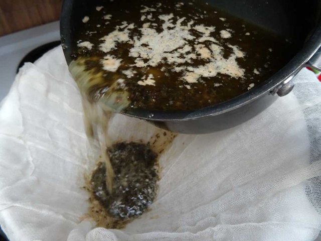 pour-weed-butter-mixture-through-cheesecloth.jpg