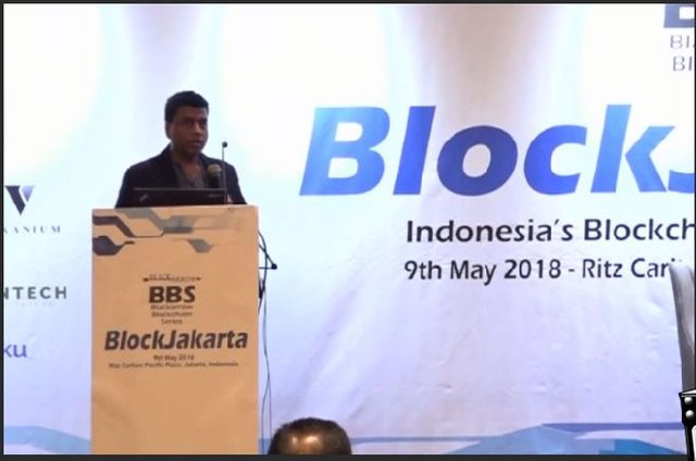 OiX.Global founder Sinha Santos speaking at BlockJakarta.JPG