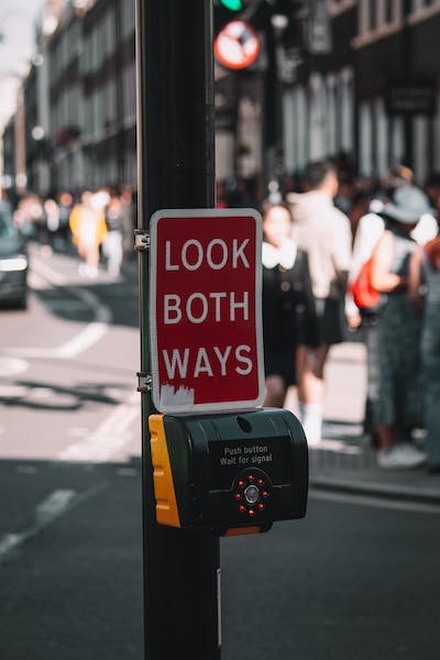 free-photo-of-a-warning-sign-on-a-pedestrian-traffic-light.jpeg