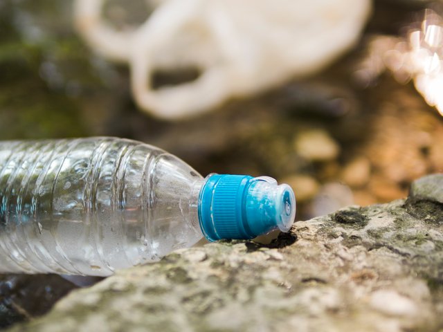 close-up-waste-plastic-water-bottle-outdoors.jpg