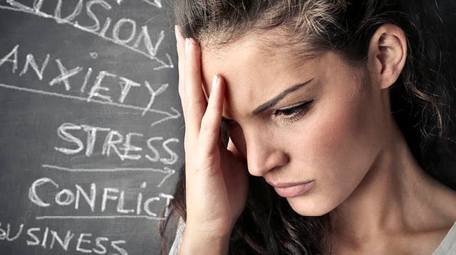 words-on-chalkboard-womans-hand-on-face.jpg