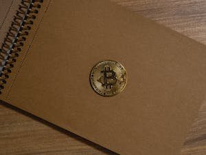 free-photo-of-close-up-photo-of-gold-bitcoin-on-a-notebook.jpeg