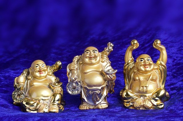 3 laughing buddha statues.jpg