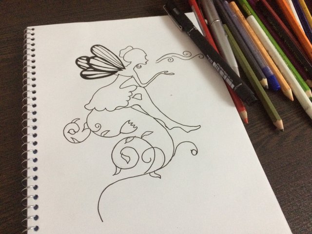 girl with butterfly wings drawing
