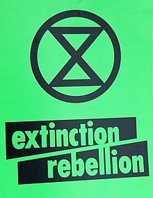 220px-Extinction_Rebellion,_green_placard_(cropped).jpg