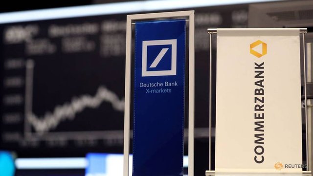 file-photo--file-photo--banners-of-deutsche-bank-and-commerzbank-are-pictured-in-front-of-the-german-share-price-index--dax-in-frankfurt-1.jpg