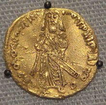 First_Umayyad_gold_dinar, Abd_al-Malik,_695_CE.jpg