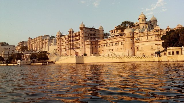 Picture showing City Palace, Udaipur, wide angle view from the backside, also showing Pichola Lake beneath it.jpg