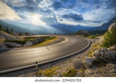 mountain-road-colorful-sunset-summer-260nw-2294201703.jpg