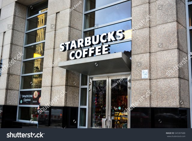 stock-photo-warsaw-poland-december-front-of-storie-and-cafe-starbucks-coffe-in-the-center-city-of-545307688.jpg