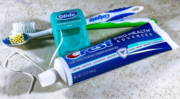 free-photo-of-close-up-of-dental-floss-toothpaste-and-toothbrushes.jpeg