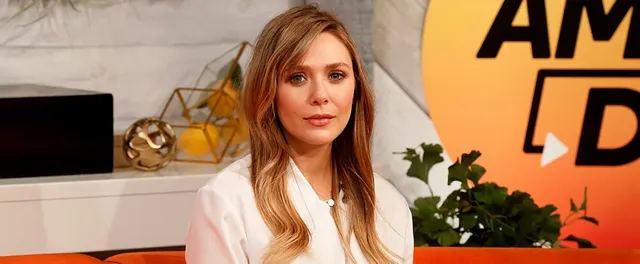 elizabeth-olsen-curtain-bangs-brown-hair-color.webp