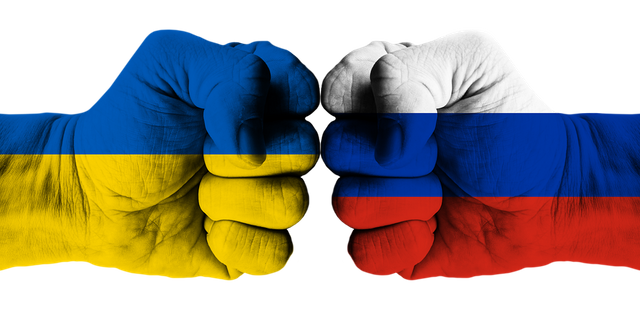 Ukraine-Flag-War-Fist-Russia-Ukraine-Independence-7036311.png