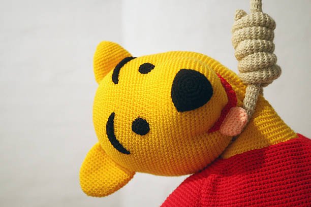 the-knitted-sculpture-winnie-pooh-by-patricia-waller-featuring-the-picture-id143427941.jpg