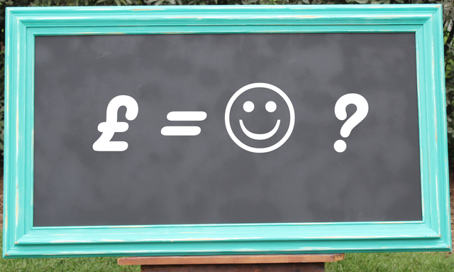 Turquoise Chalk Board - can money buy happiness.png