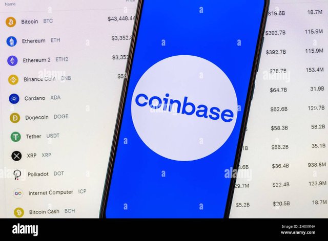 coinbase-logo-on-the-background-of-the-list-of-cryptocurrencies-traded-on-the-exchange-2H0X9NA.jpg