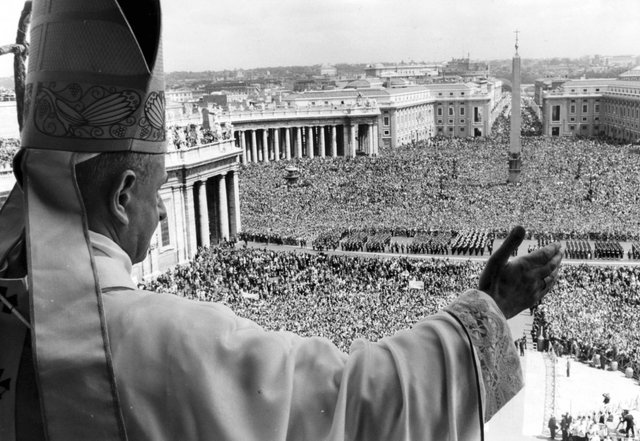 pope-paul-vi-looks-over-saint-peters-square-which-is-filled-with-nearly-half-a-million-people-listening-to-his-easter-message-on-easter-sunday-april-10-1966.jpg