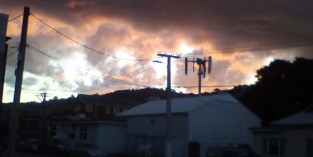 SunsetThroughImpendingThunderstormOverWellington20November2019.png