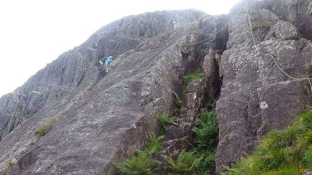 150 Kieran walking down the rocks and catching the rope.jpg