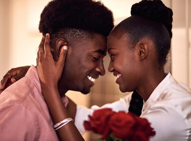 black-people-couple-smile-with-roses-love-care-support-valentines-day-home-relationship-forehead-touch-with-flowers-as-gift-present-romance-with-anniversary-celebration_590464-444306.jpg