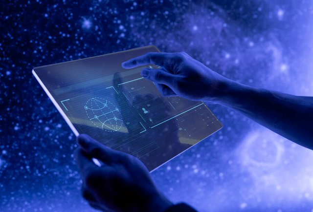 researcher-using-transparent-digital-tablet-screen-futuristic-technology-905x613.jpg