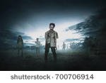 stock-photo-crowd-of-aggressive-asian-zombies-walking-around-on-the-spooky-countryside-700706914.jpg