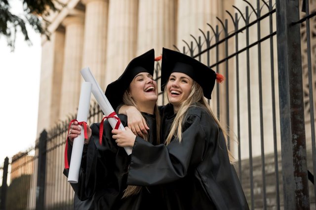 cheerful-colleagues-graduating-college1.jpg