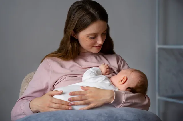 medium-shot-mother-with-cute-newborn_23-2150276274.webp
