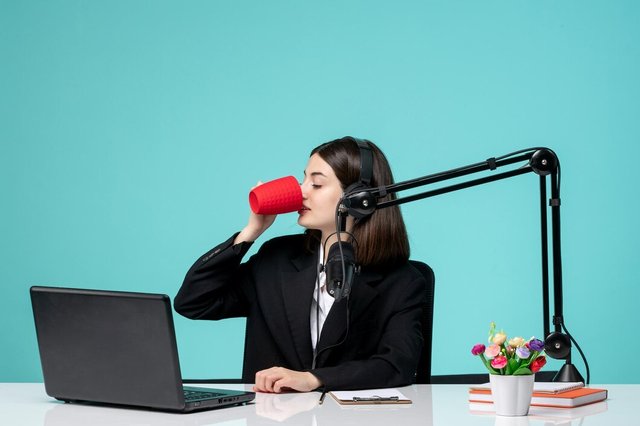 blogger-journalist-brunette-cute-girl-black-blazer-recording-speech-camera-drinking-coffee_140725-165699.jpg