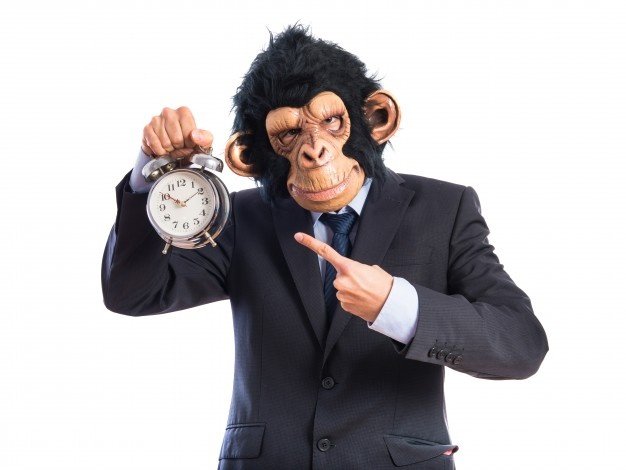 monkey-man-holding-vintage-clock_1368-7132.jpg