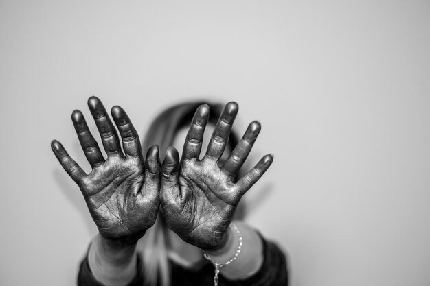 woman-with-painted-hands-against-gray-background_1048944-28850083.jpg