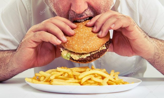 depositphotos_73149589-stock-photo-man-eating-burger-and-french.jpg