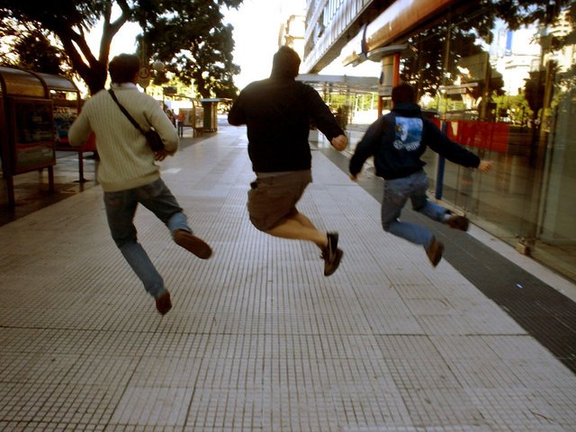 friends-friendship-boy-jump-jumping-sidewalk-person-portraid-play-playing-bodies-walk-walking-back-boys-man-men-studients-joking-1437561.jpg